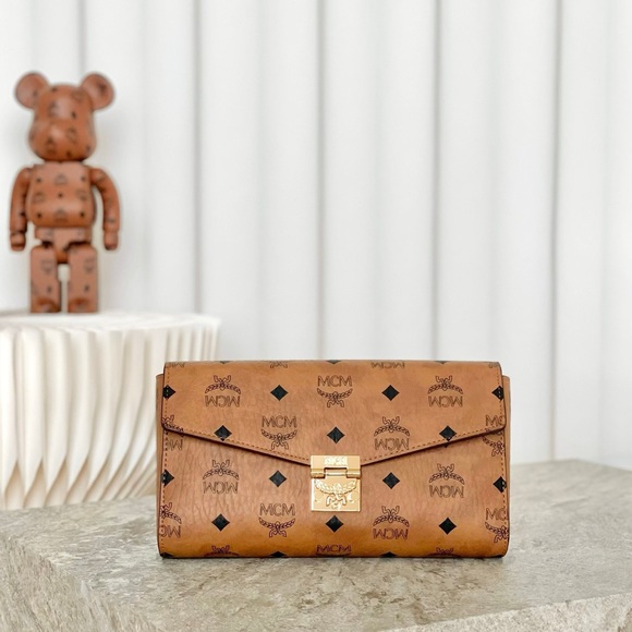 MCM Tan Monogram Clutch with Gold Clasp - Picture 1 of 9